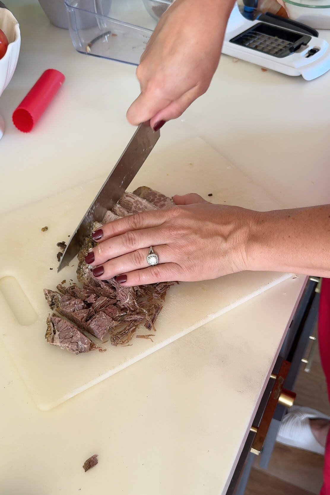 Chopping brisket for making brisket chili.